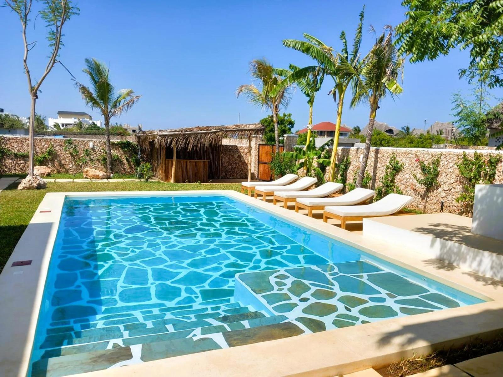 Tatu Inn Boutique Hotel วาตามู ภายนอก รูปภาพ